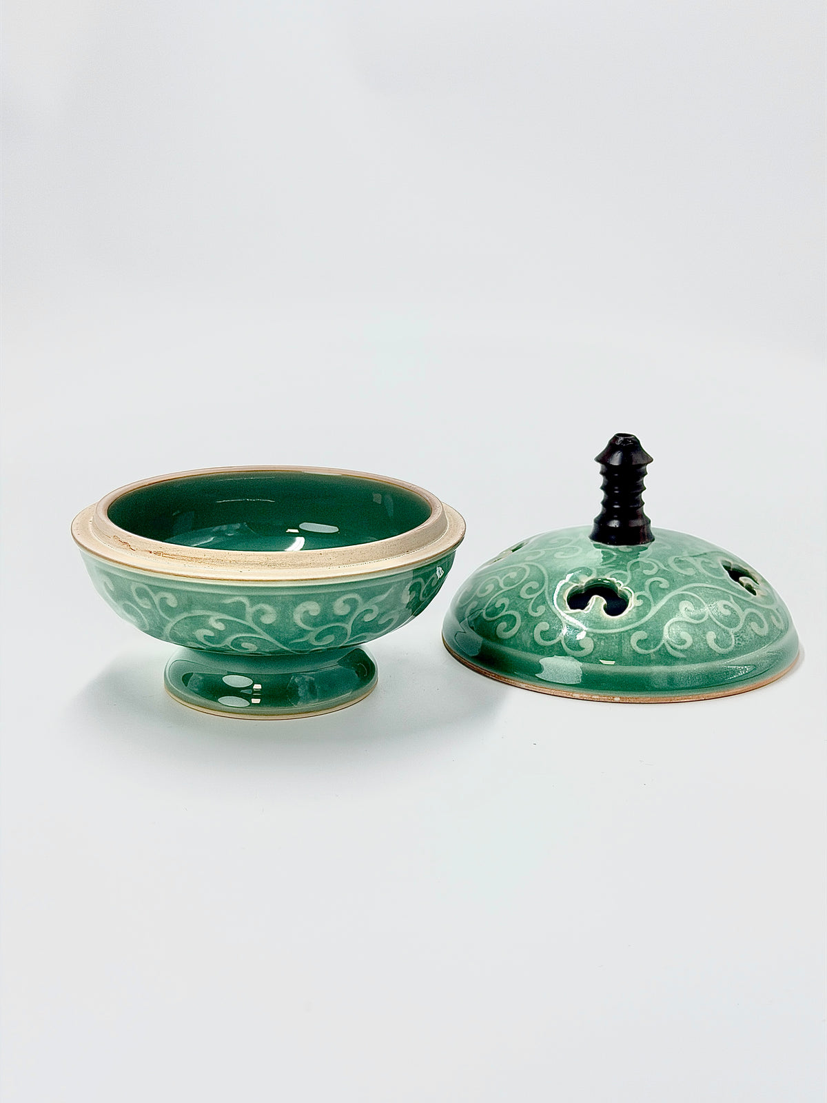Longquan Celadon Incense Burner with Scrolling Lotus Pattern and Wooden Pellets