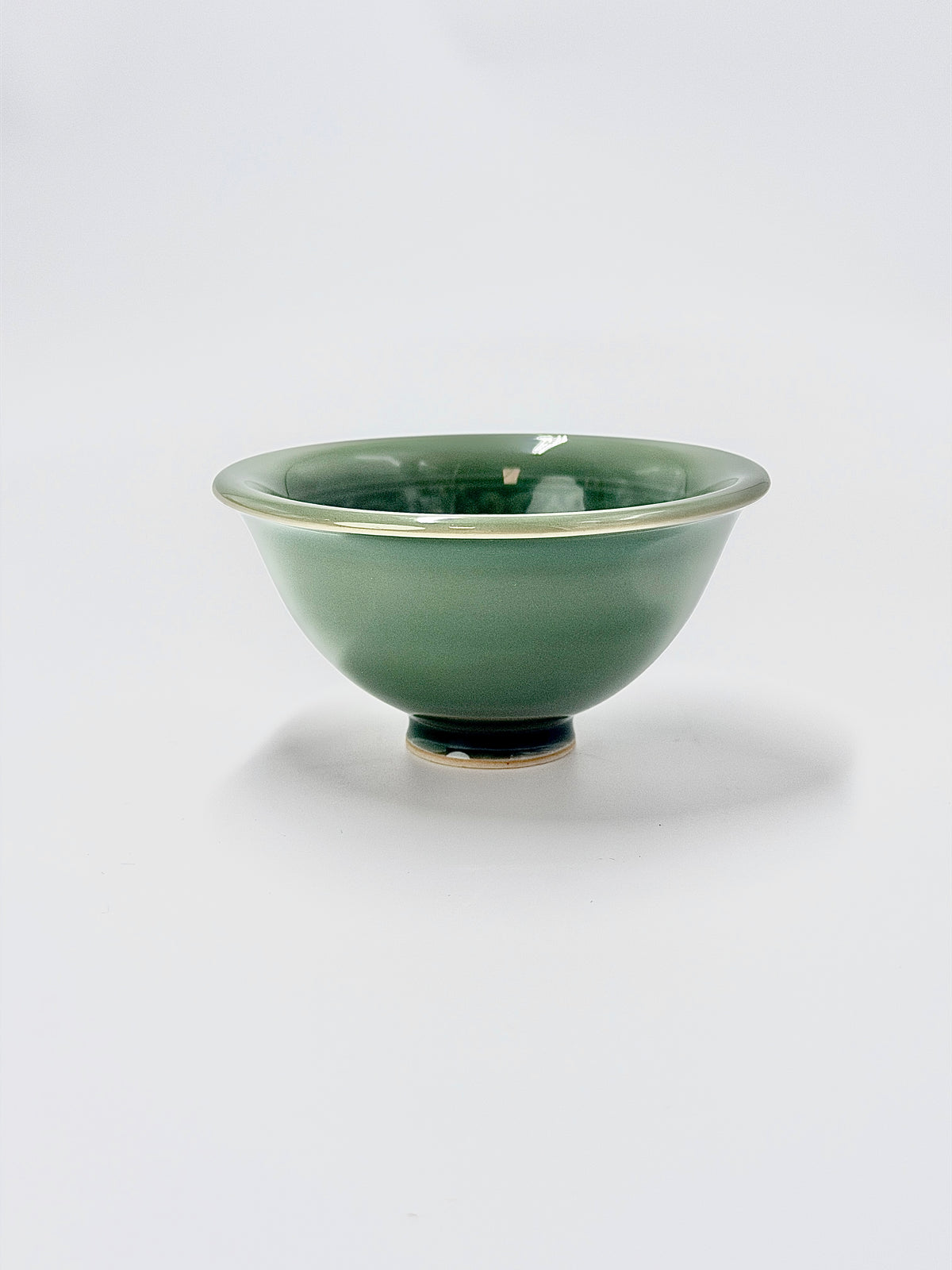 Longquan celadon cup with incised lotus scroll patterns