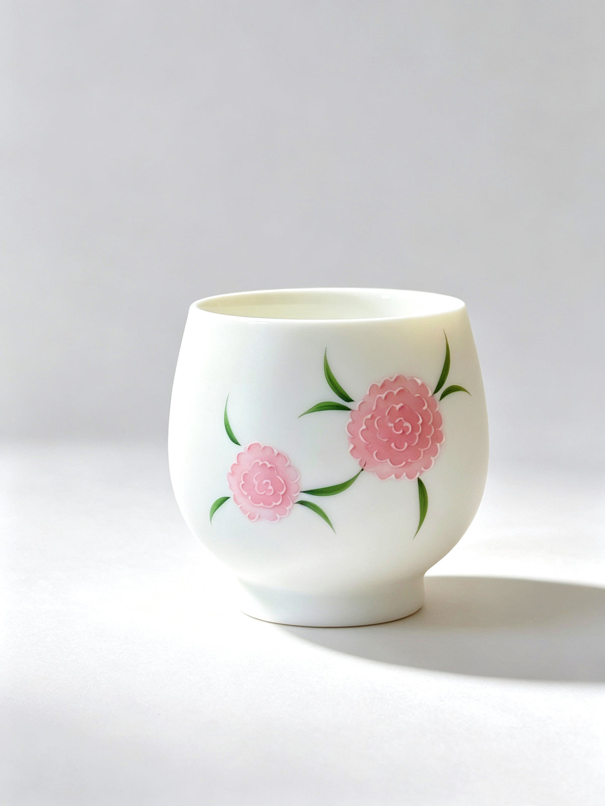 Hand-painted floral motif master cup