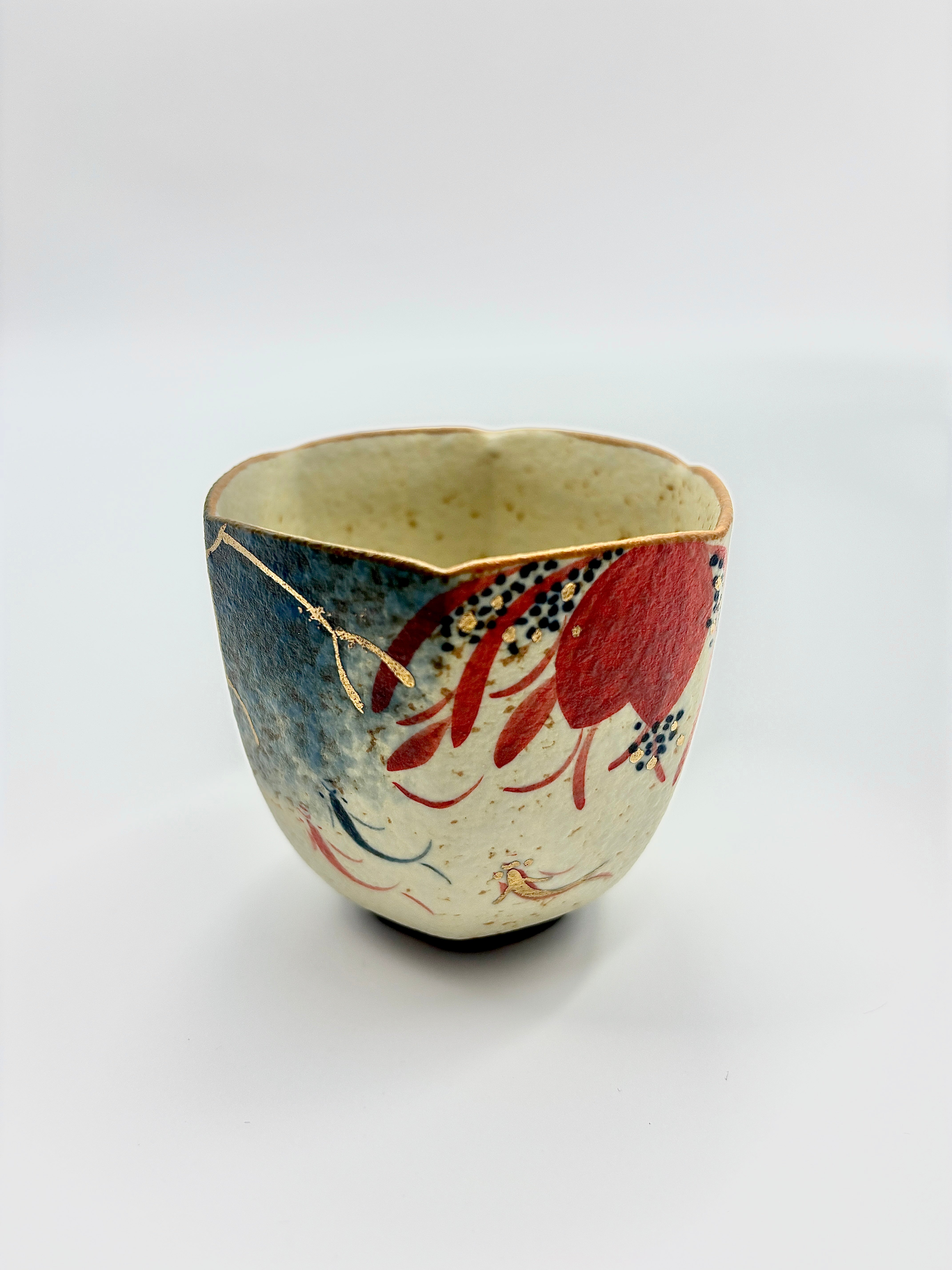 Blue and white flint and gold-painted lotus hexagonal cup