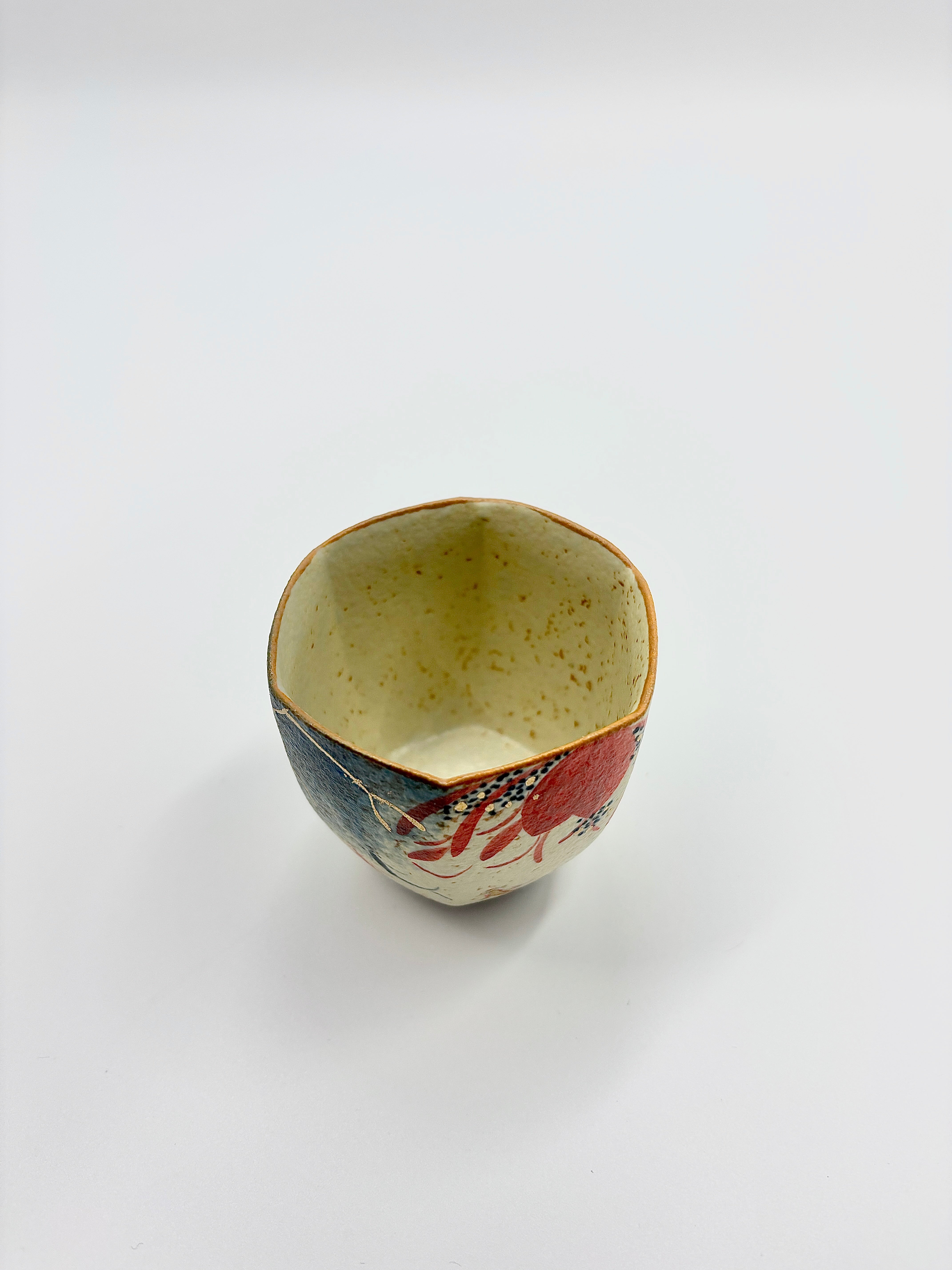 Blue and white flint and gold-painted lotus hexagonal cup